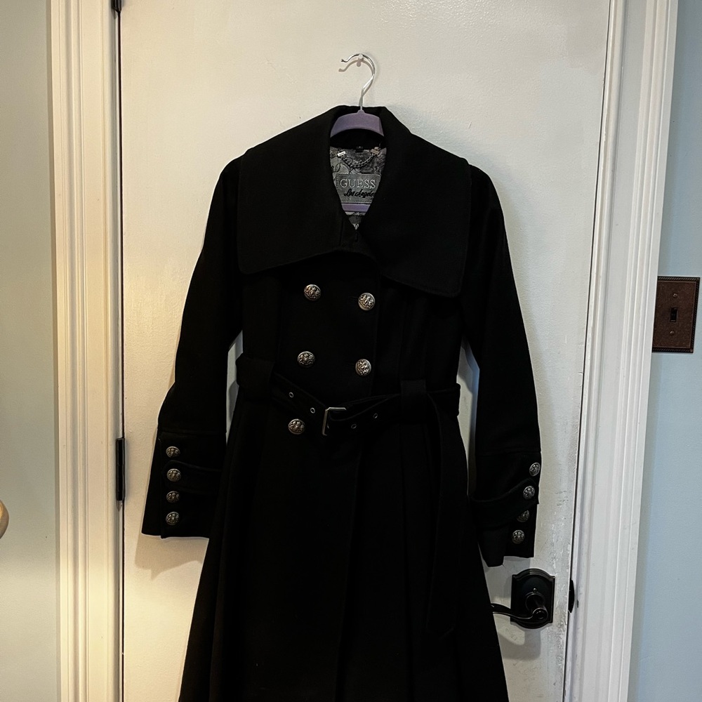Black wool jacket ( missing button under tie)